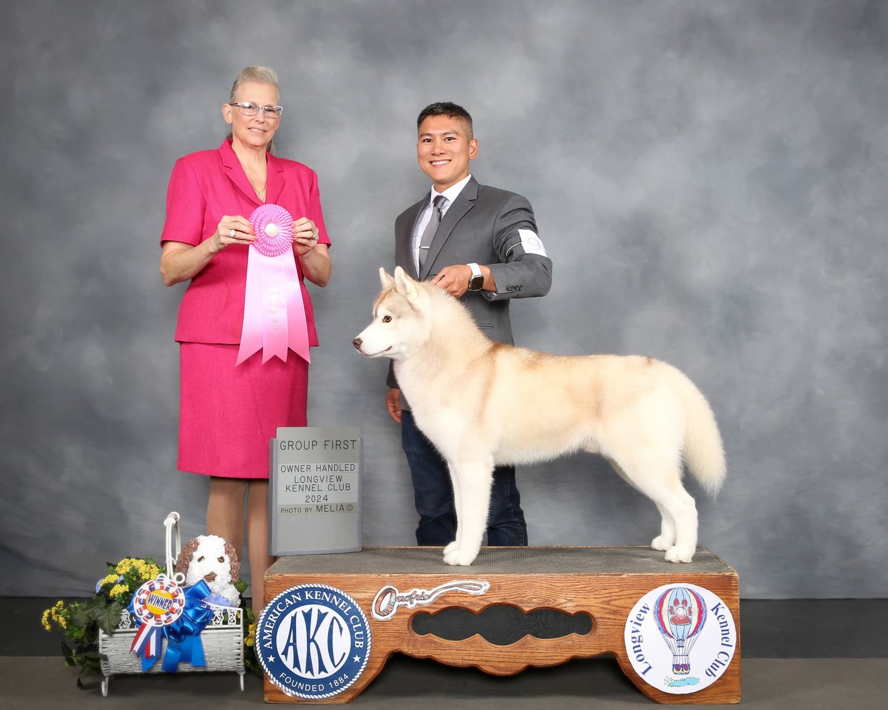 Esteban winning Group First at Longview Kennel Club in 2024 with his handler and judge
