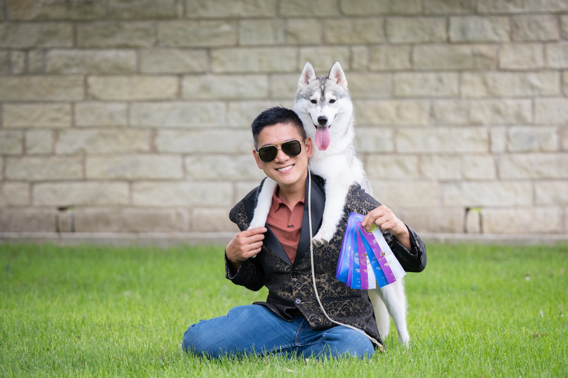 Ben with an Arkinlight Siberian Husky and show ribbons